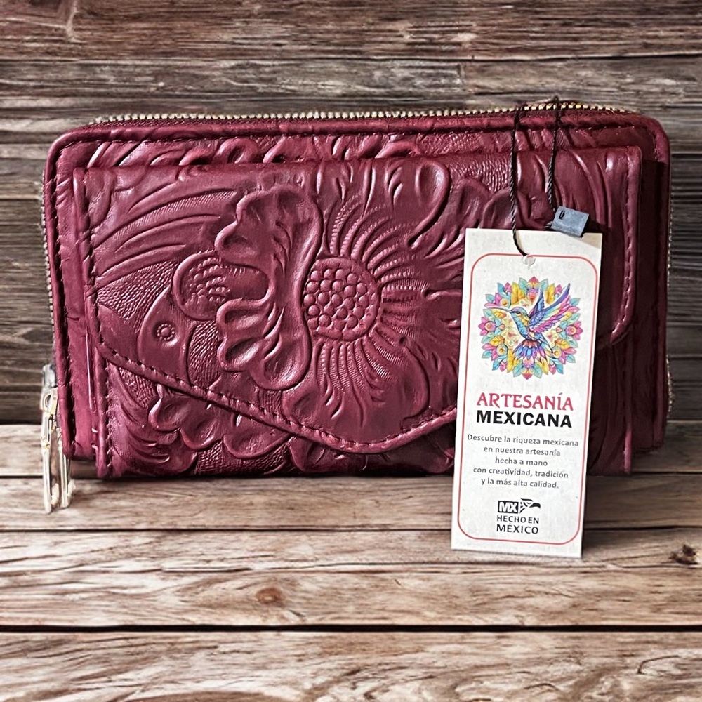Pink Embossed Leather Wallet with Intricate Detailing